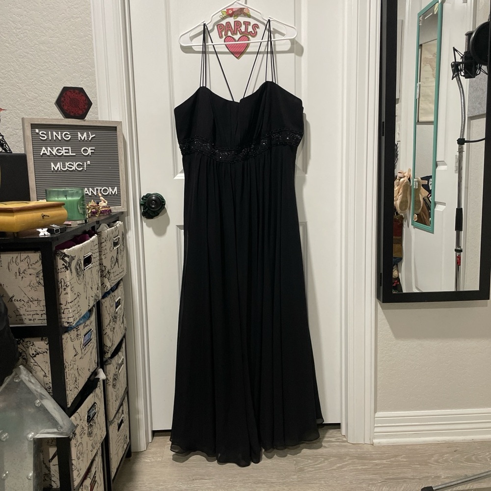 Size 26 Black Davids Bridal dress, featuring a zipper closure